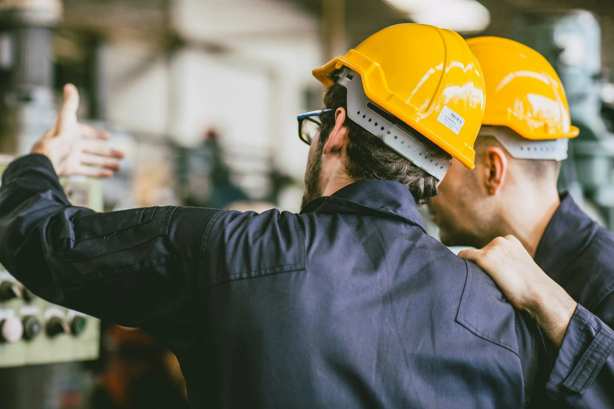 Engineer worker working together training technical give education solve machine problem in factory